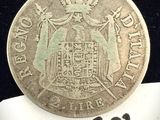 gros plan d'une pièce de monnaie surmontée d'une couronne