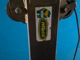 a close up of a machine with a sticker on it