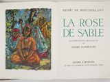 a book with a picture of a woman sitting on the ground