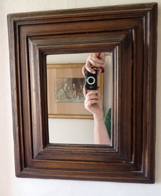 une personne se prenant en photo dans un miroir