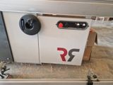a machine that is sitting on a table in a room