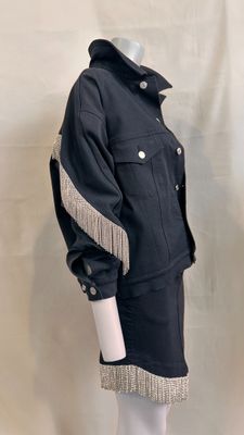 black jacket and skirt with fringes on mannequin mannequin mannequin mannequin mannequin mannequin mannequin mannequin