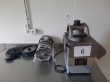 a machine that is sitting on a table in the kitchen