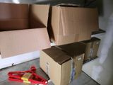 two boxes and a pair of scissors on the floor