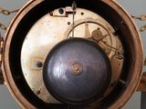 a clock that is hanging on the wall