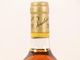 a bottle of whiskey that is sitting on a table