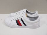 a pair of white sneakers with red, white and blue stripes