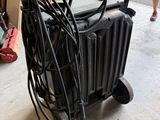 a cart that has a bunch of wires on it