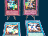 three cards are displayed in a display case on a blue background