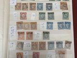 un livre avec beaucoup de timbres