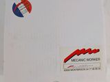 a white box with a red and blue sticker on it