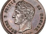 Gros plan sur une pièce de monnaie portant le visage d'un homme