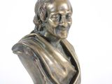 statue of a bust of a man on a marble base