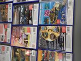 a lot of magazines on the wall of a store