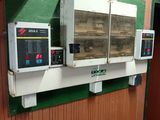 three ovens that are on the wall in the kitchen