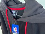 a close up of a jacket with a name tag on it