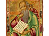 un tableau représentant un homme à la longue barbe tenant un livre