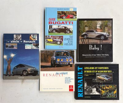plusieurs livres posés sur une table blanche, avec une voiture et un camion