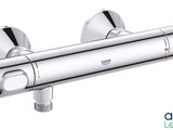 a close up of a shower faucet on a white background