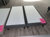 two beds that are sitting on top of each other
