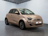 the smart car is parked in a large room with white walls