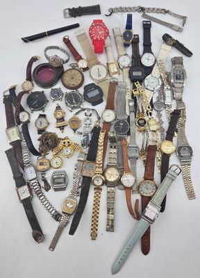many different types of watches on a white surface