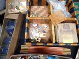 boxes of assorted items are sitting on a table in a room