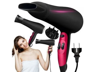 a woman in a towel holding a hair dryer and a hair dryer