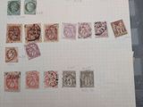 a sheet of paper that has a bunch of stamps on it