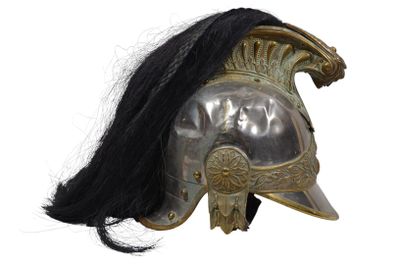 a helmet with a long black hair on top of it
