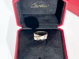a red box with a silver ring inside of it