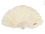 a white fan that is on top of a table