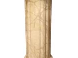 a white pedestal with a marble top on a white background
