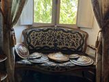 an image of a living room with a couch and a window