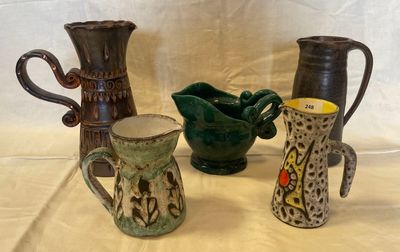 three different types of vases on a table
