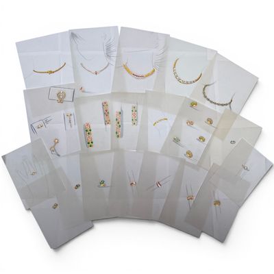 a bunch of cards with different designs on them on a white surface