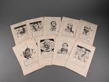 un tas de vieilles cartes représentant des personnages de dessins animés, posées sur une table