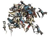 a pile of assorted legos sitting on a white surface