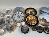 many plates and bowls that are sitting on a table