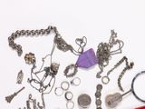 a lot of silver items on a white surface
