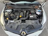 the engine of a car with its hood open and the hood open
