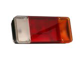 a close up of a red and white light on a white background