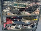 a cart with many items in it in a warehouse
