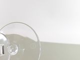 a wine glass that is sitting on a table