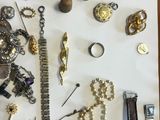 many different types of jewelry on the table