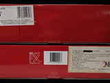 two red boxes with a price tag on them