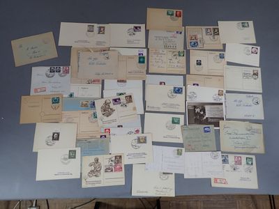 a table with a bunch of old postcards on it