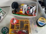 many different types of fishing lures in this container