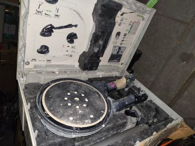 an old record player sitting on top of a table