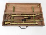 an image of a wooden box with a set of tools in it